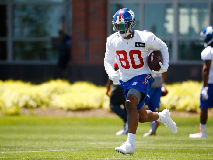 victor-cruz-running-ball-training-camp.jpg
